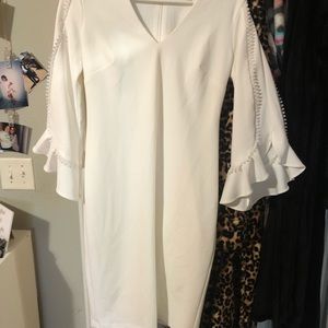 This is a gorgeous, white Calvin Klein dress!